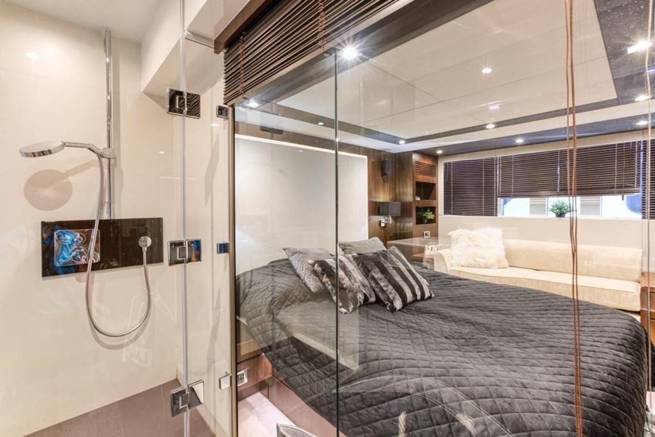 a bed in a room aboard LANA 1 Yacht for Sale