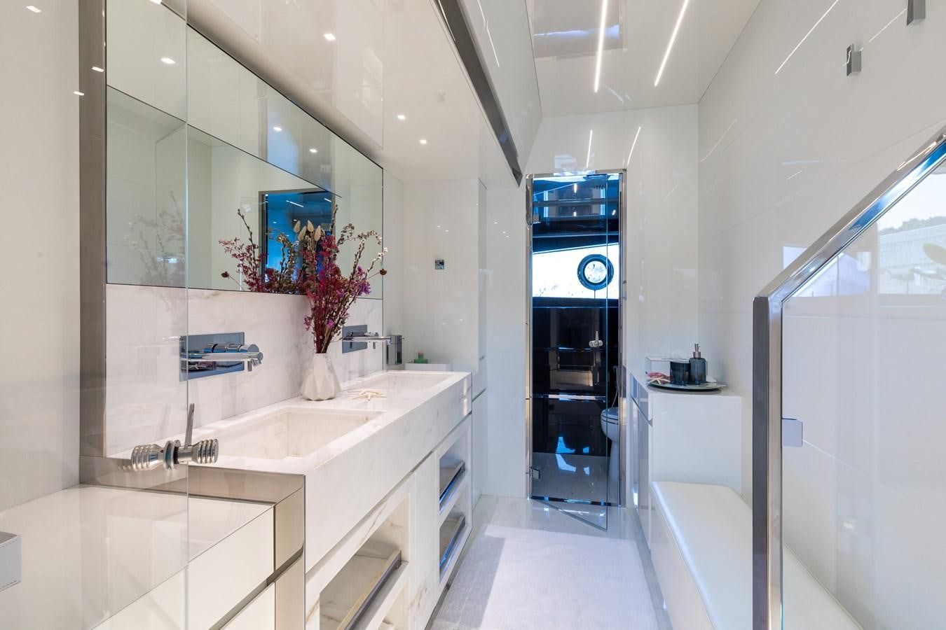 a bathroom with a sink and a mirror aboard RIES Yacht for Sale