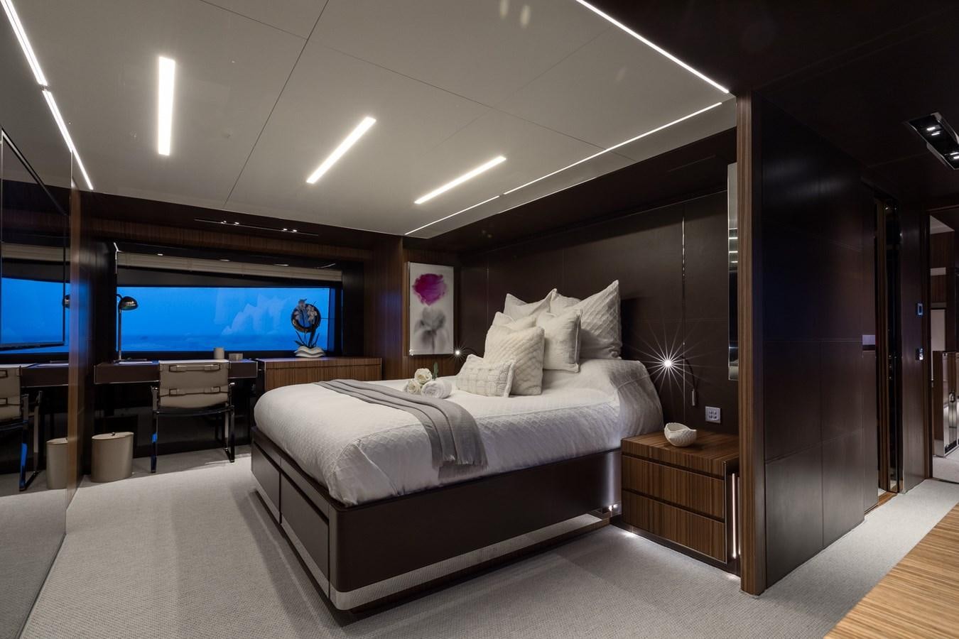 a bedroom with a large tv aboard RIES Yacht for Sale