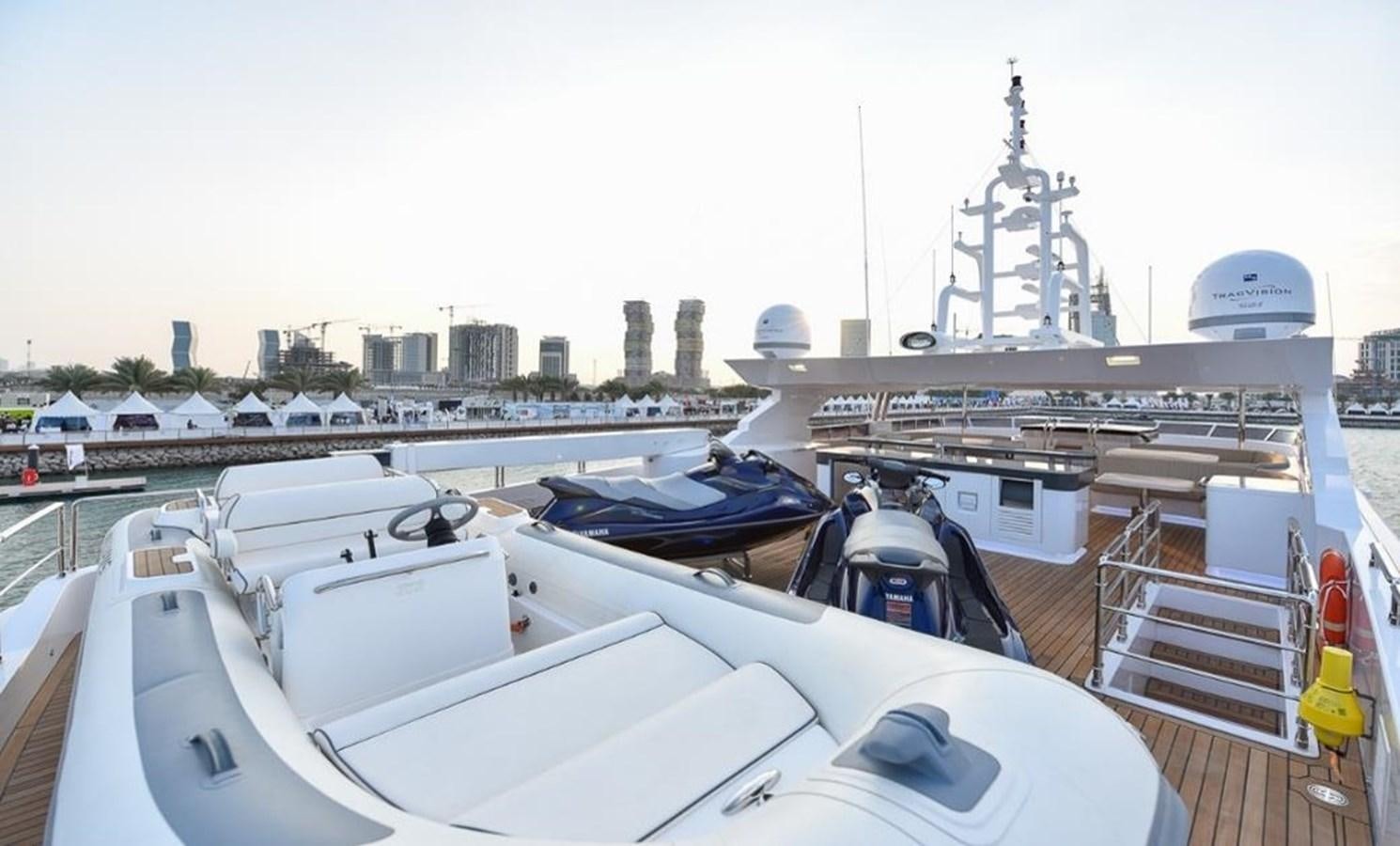 a boat docked at a pier aboard 'H Yacht for Sale