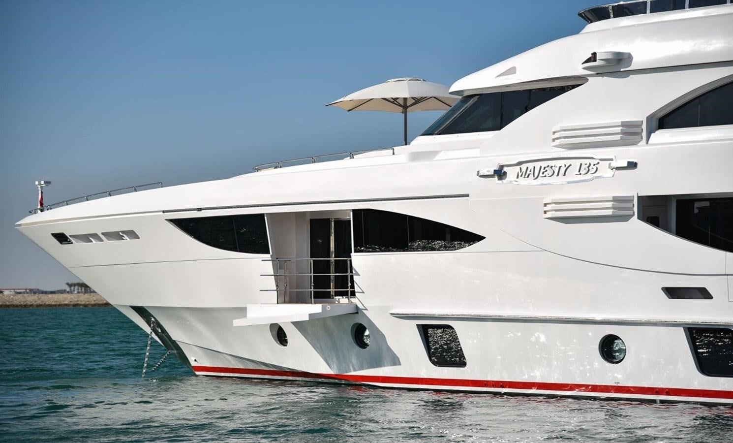 a white yacht in the water aboard 'H Yacht for Sale