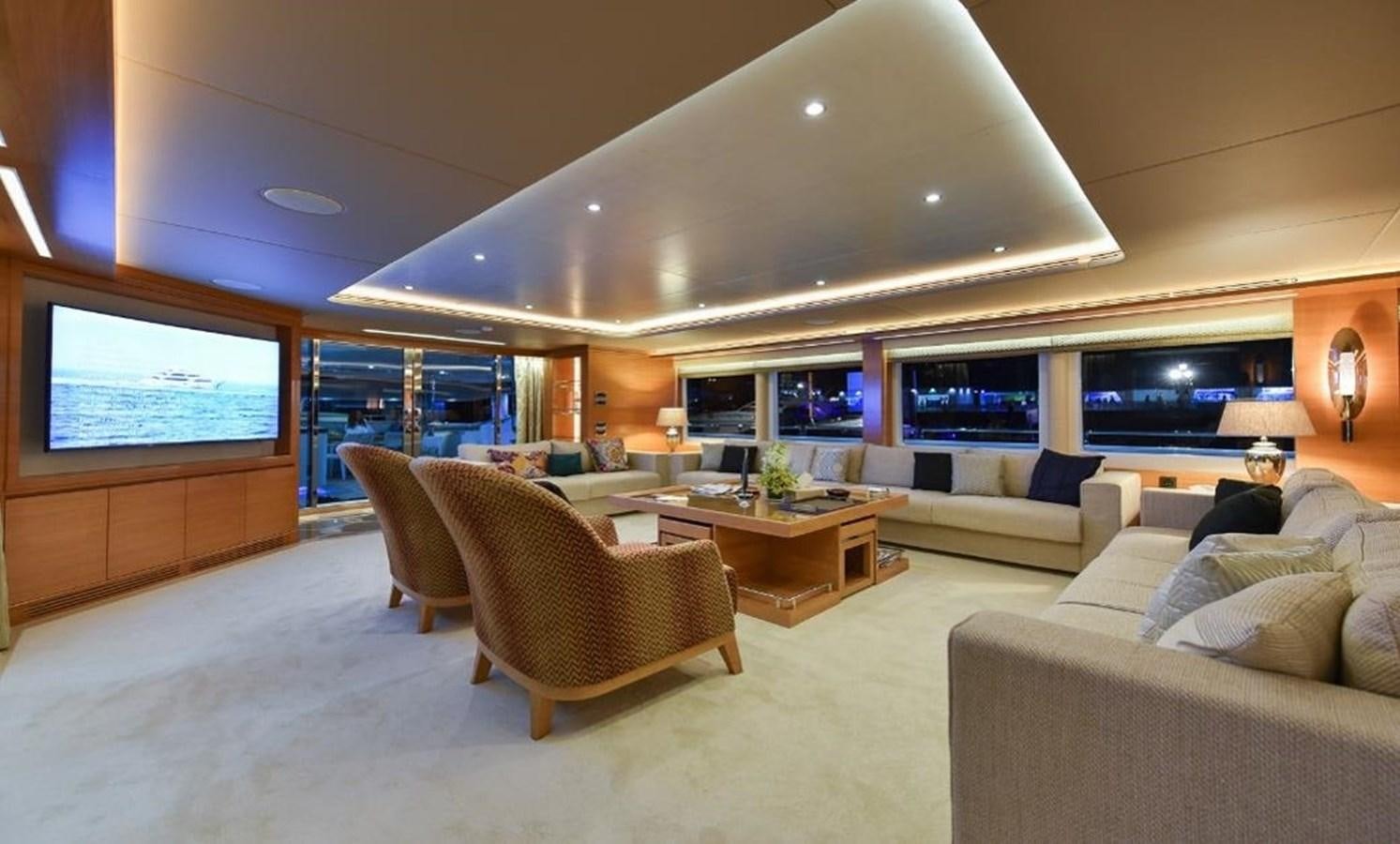 a living room with a large open floor plan aboard 'H Yacht for Sale
