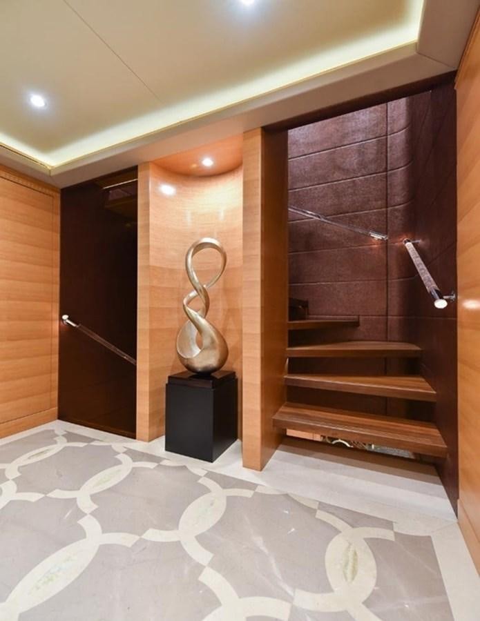 a bathroom with a large marble floor aboard 'H Yacht for Sale