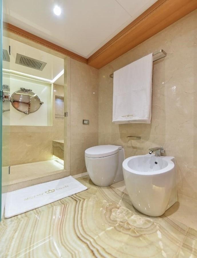 a bathroom with a toilet and sink aboard 'H Yacht for Sale