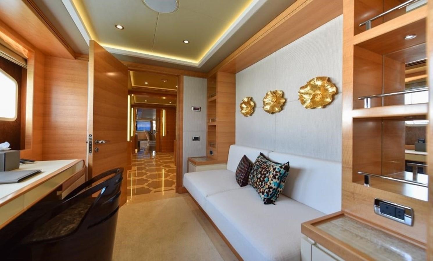 a room with a bed and a desk aboard 'H Yacht for Sale