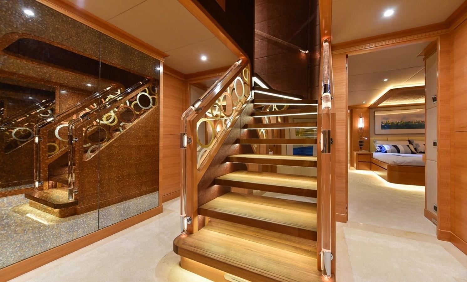 a staircase in a building aboard 'H Yacht for Sale