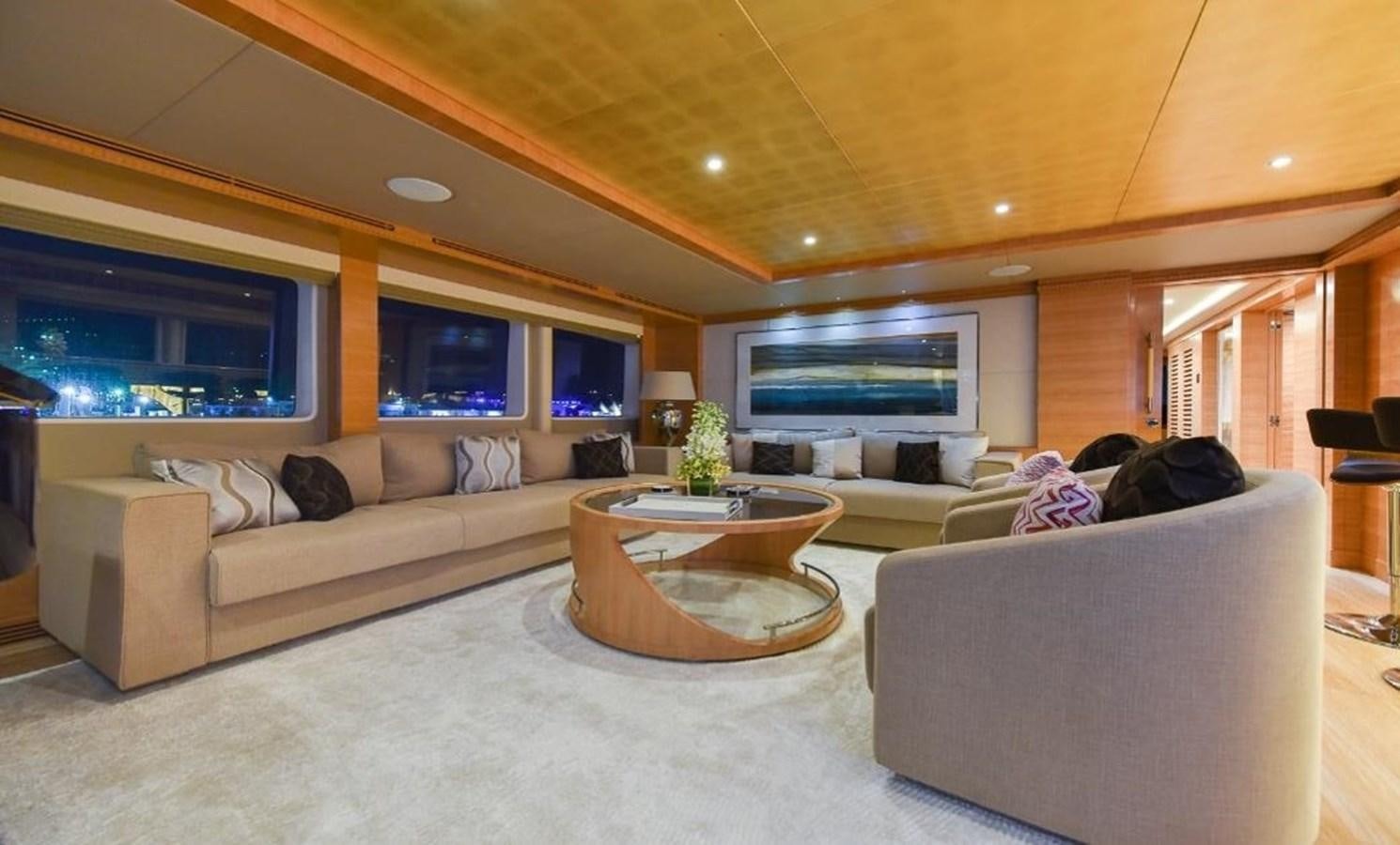 a living room with a couch and a tv aboard 'H Yacht for Sale
