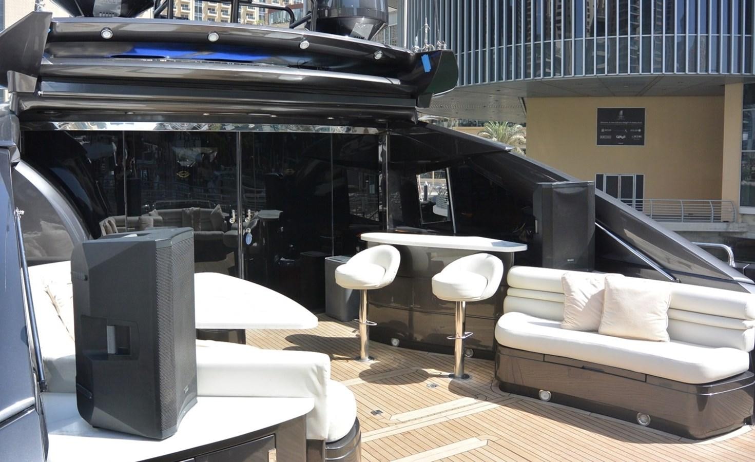a room with a bed and a table aboard 2004 SUNSEEKER PREDATOR 95 Yacht for Sale