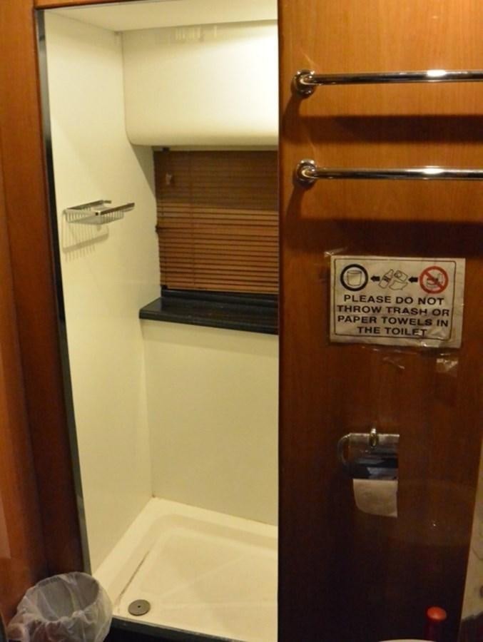 a door with a sign on it aboard 2004 SUNSEEKER PREDATOR 95 Yacht for Sale