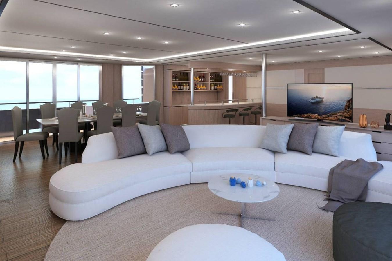 a living room with a large sofa aboard INDEPENDENCE 110 Yacht for Sale