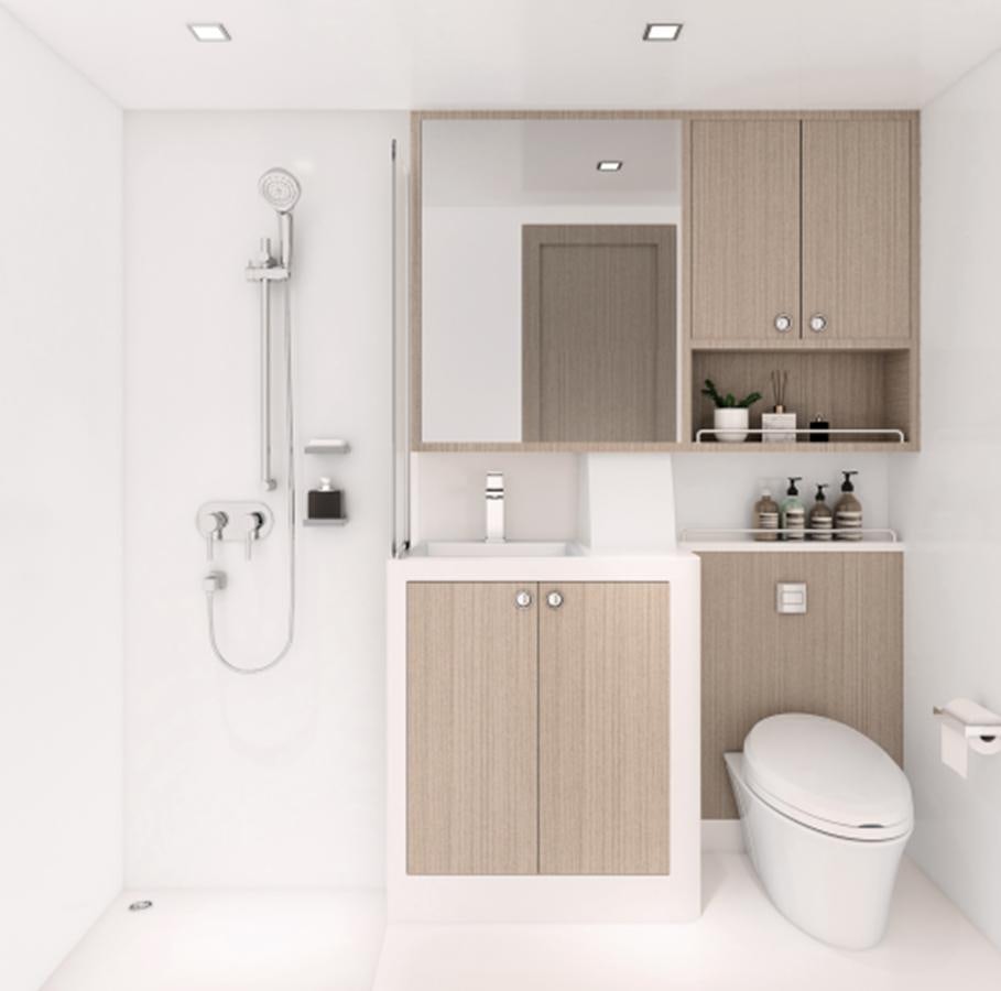 a bathroom with a toilet and a sink aboard INDEPENDENCE 110 Yacht for Sale