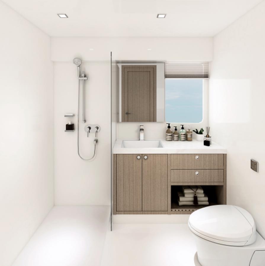 a bathroom with a sink and a toilet aboard INDEPENDENCE 110 Yacht for Sale