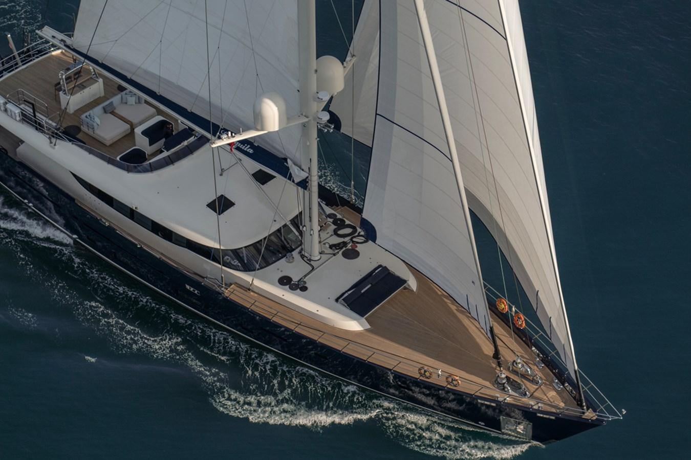 a large boat in the water aboard L'AQUILA Yacht for Sale