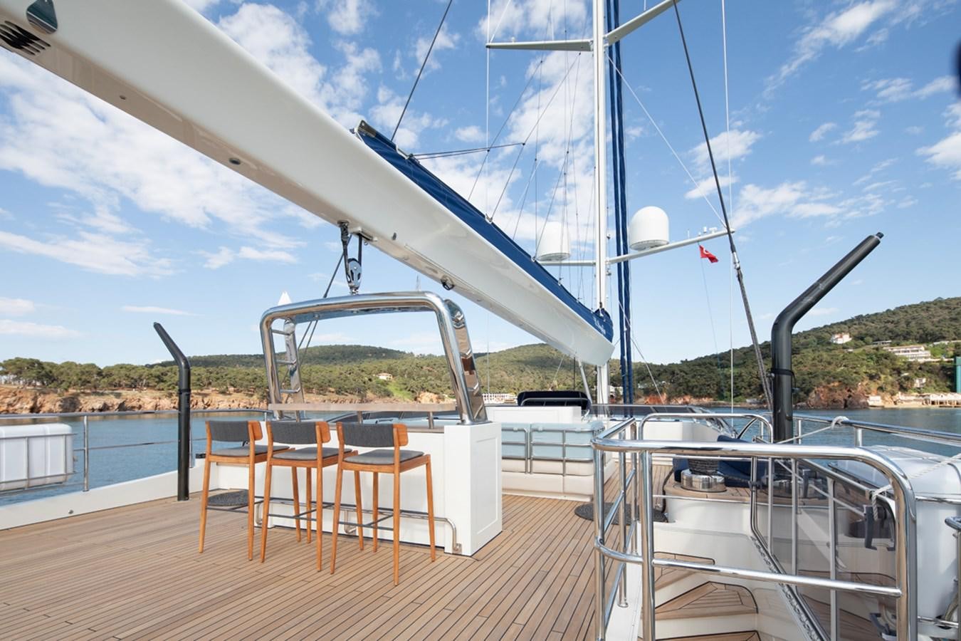 a deck with a large sailboat aboard L'AQUILA Yacht for Sale