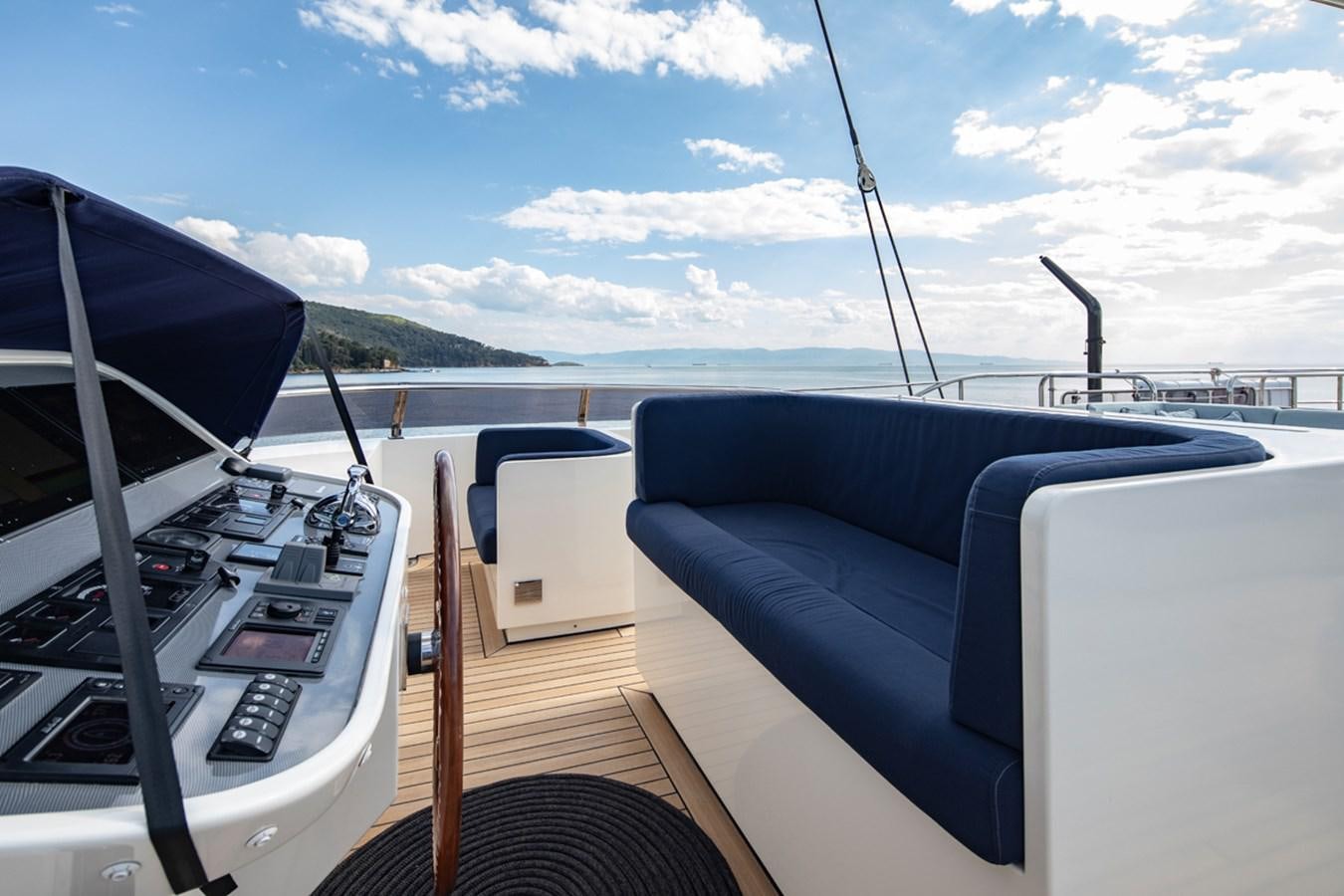 a boat on the water aboard L'AQUILA Yacht for Sale