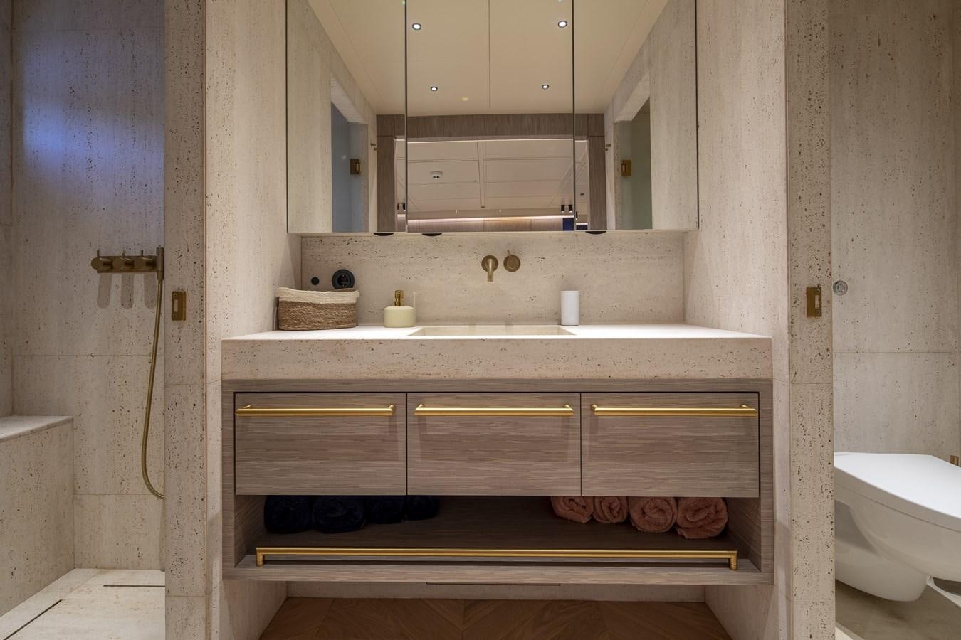 a bathroom with a sink and a toilet aboard L'AQUILA Yacht for Sale