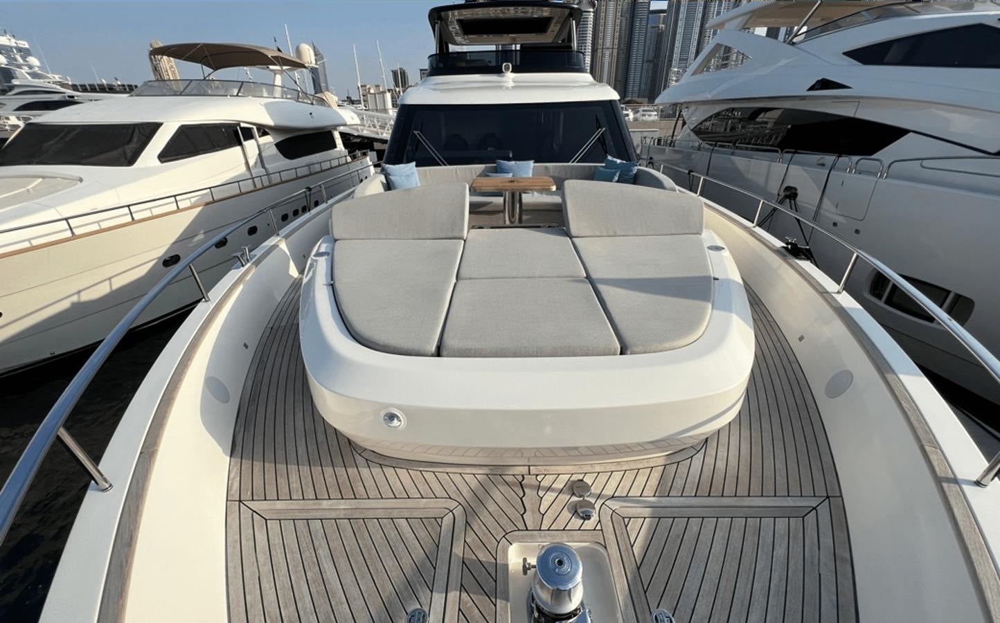 a white yacht on a deck aboard 2022 CRANCHI 78 Yacht for Sale