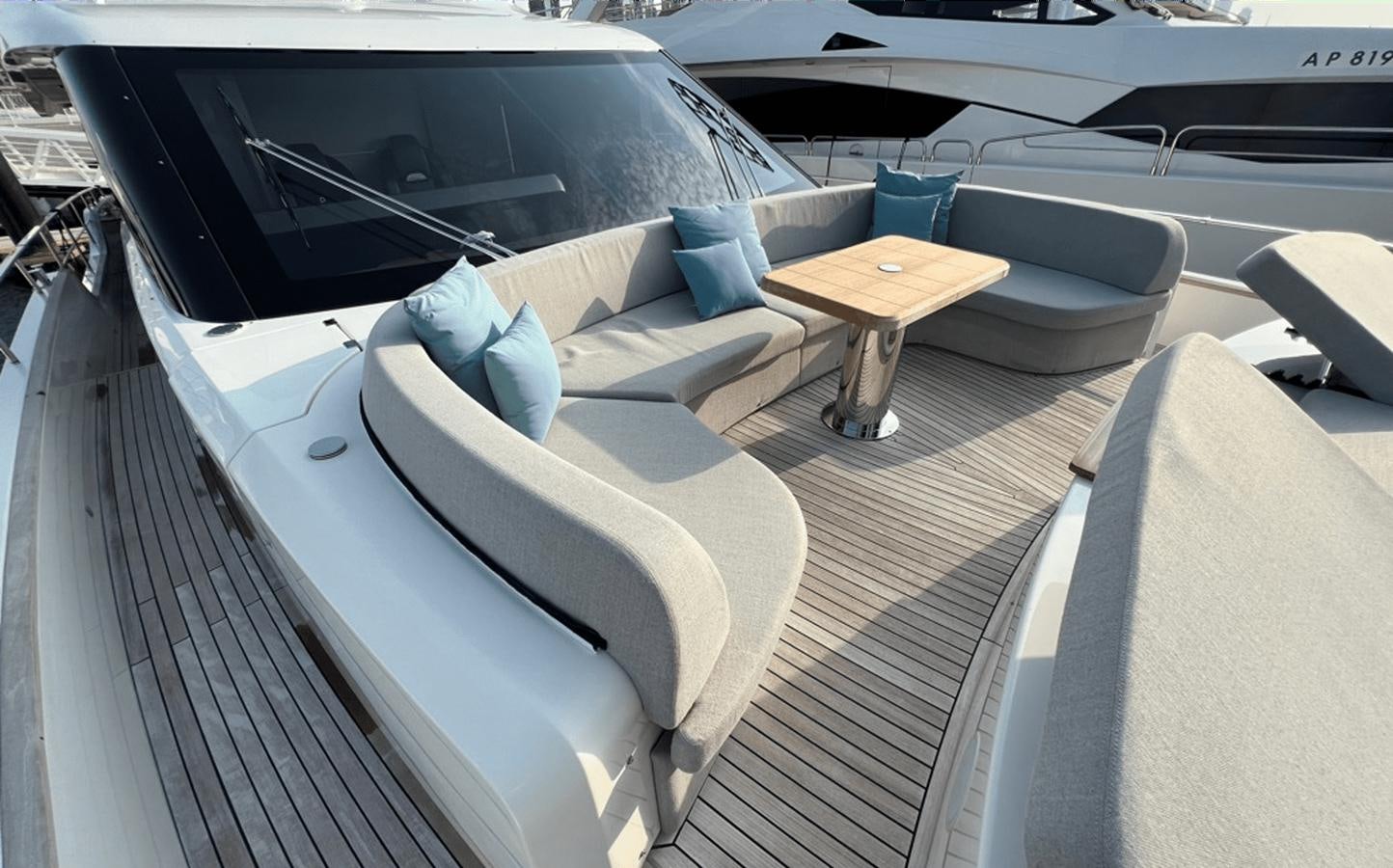 a boat with a table and chairs aboard 2022 CRANCHI 78 Yacht for Sale