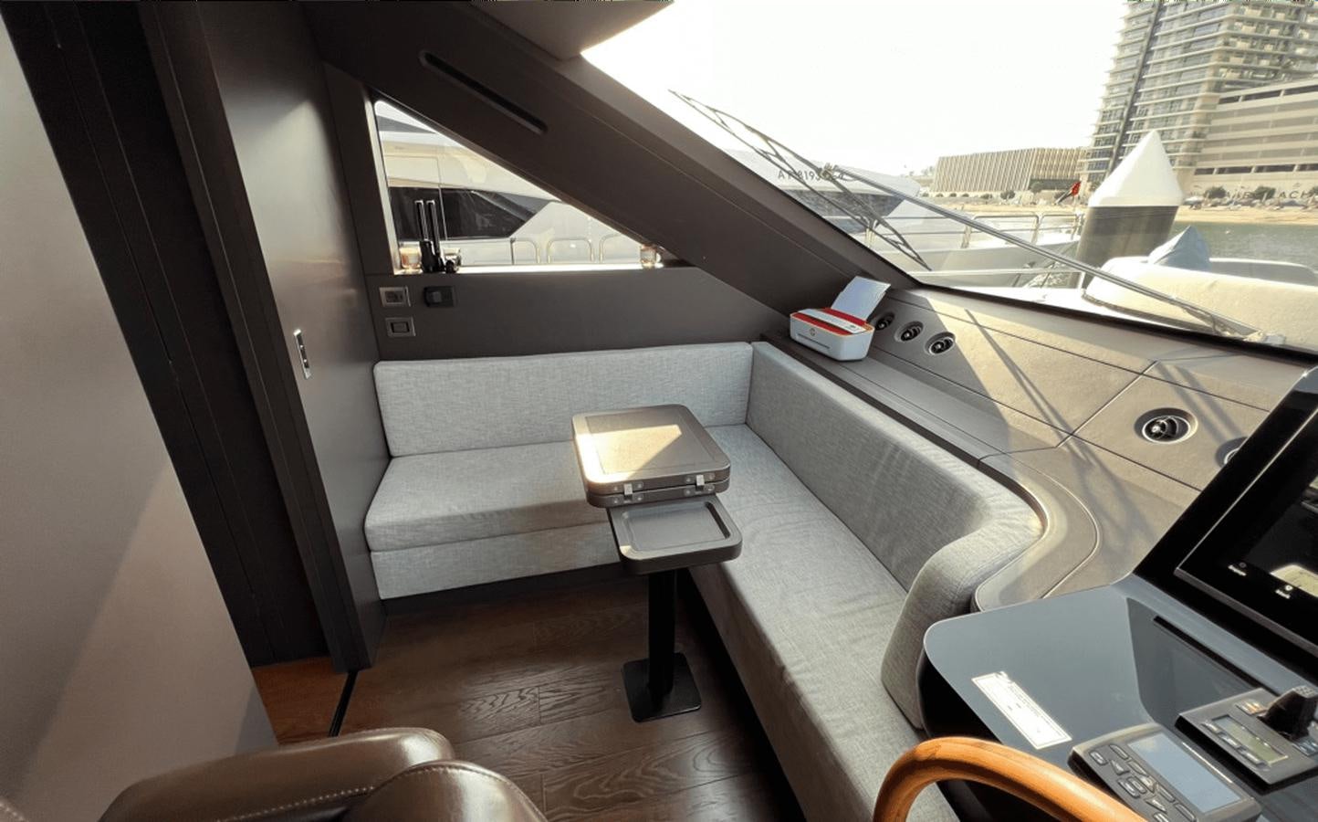a couch in a room aboard 2022 CRANCHI 78 Yacht for Sale