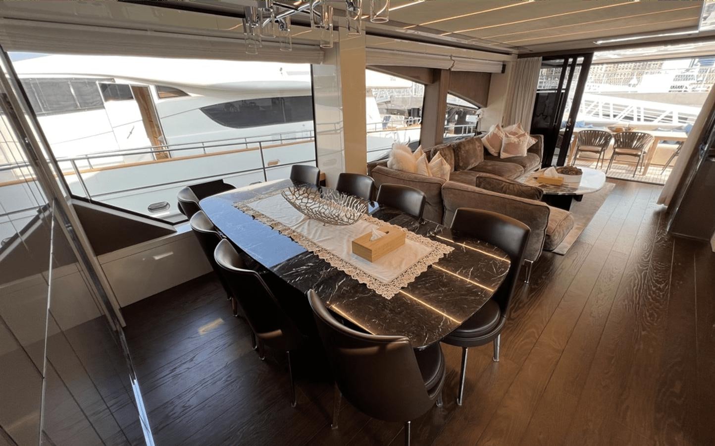 a dining table in a boat aboard 2022 CRANCHI 78 Yacht for Sale