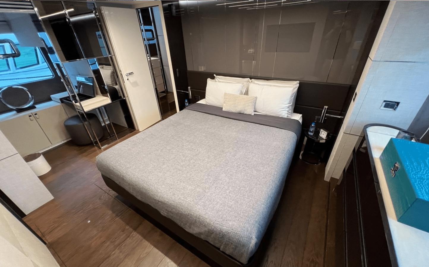 a bed in a room aboard 2022 CRANCHI 78 Yacht for Sale