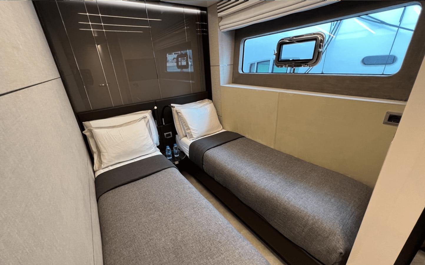 a bed in a train aboard 2022 CRANCHI 78 Yacht for Sale