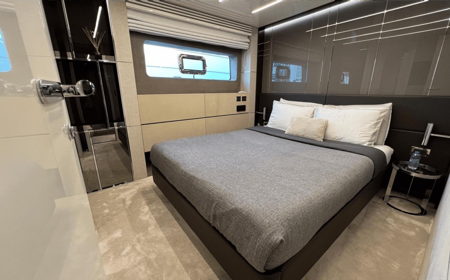 a bed in a room aboard 2022 CRANCHI 78 Yacht for Sale