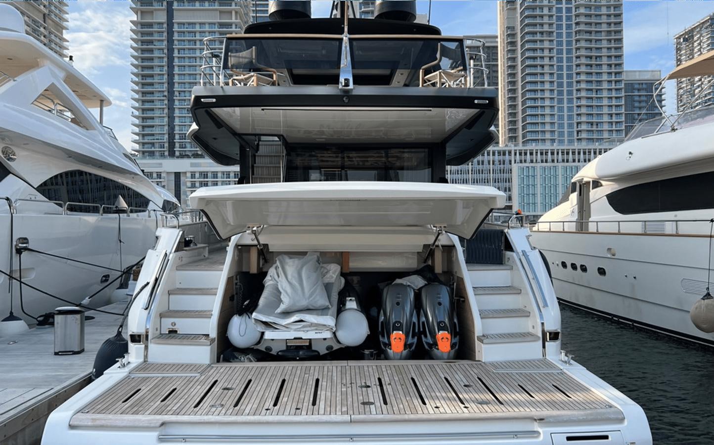 a boat docked at a pier aboard 2022 CRANCHI 78 Yacht for Sale