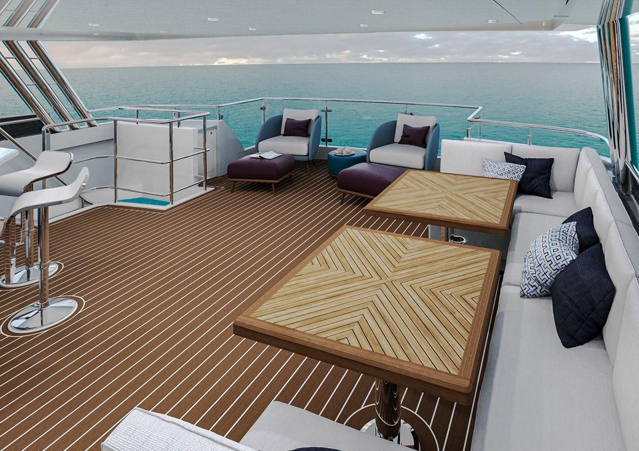 a room with a couch and a table and chairs aboard STELLARCAT AL2502 Yacht for Sale