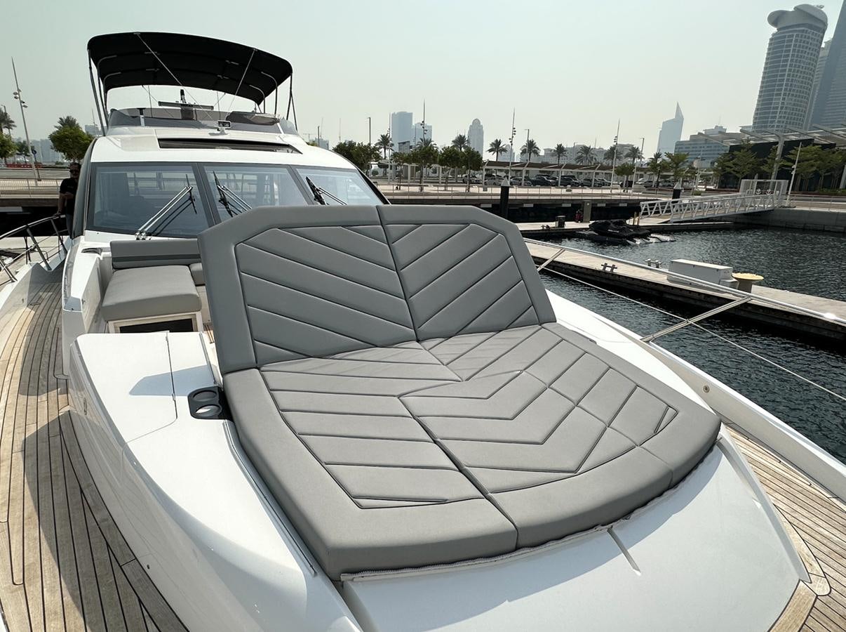 a boat on a deck aboard 2023 SUNSEEKER 74 SPORTS  XPS Yacht for Sale