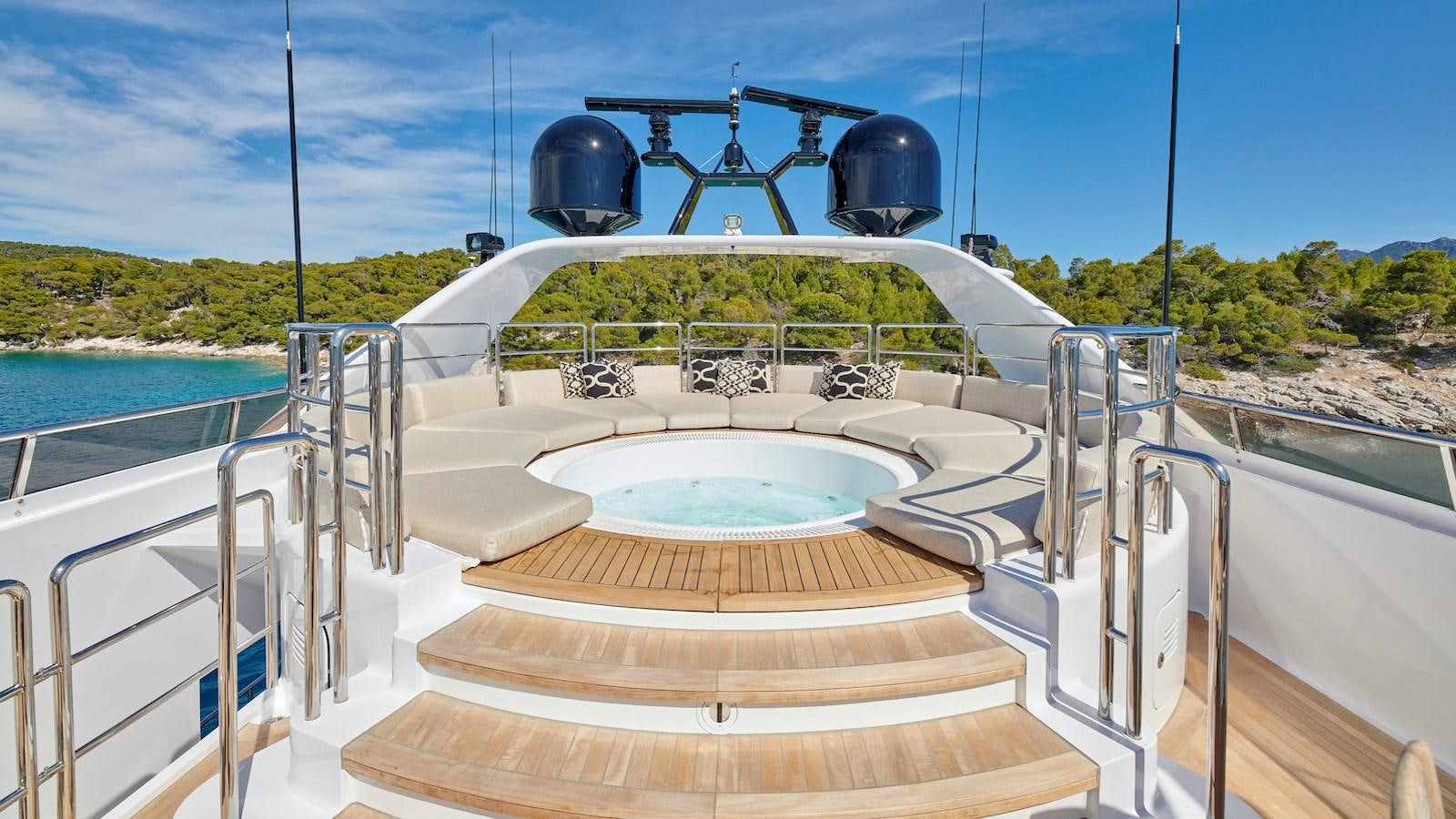 a boat with a large round black object on the front aboard DALOLI Yacht for Sale