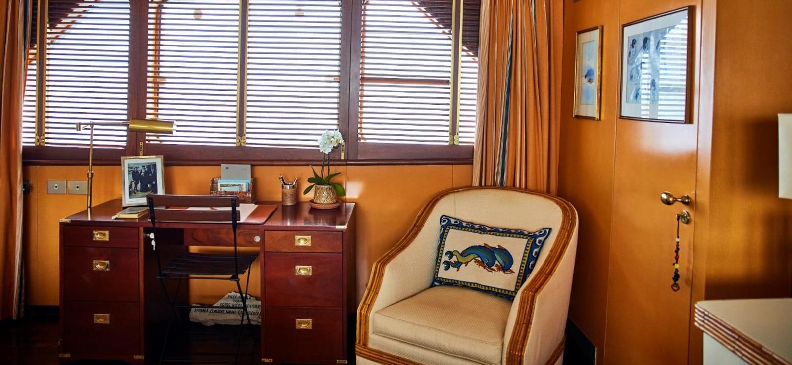 a room with a desk and a chair aboard AETEA Yacht for Sale