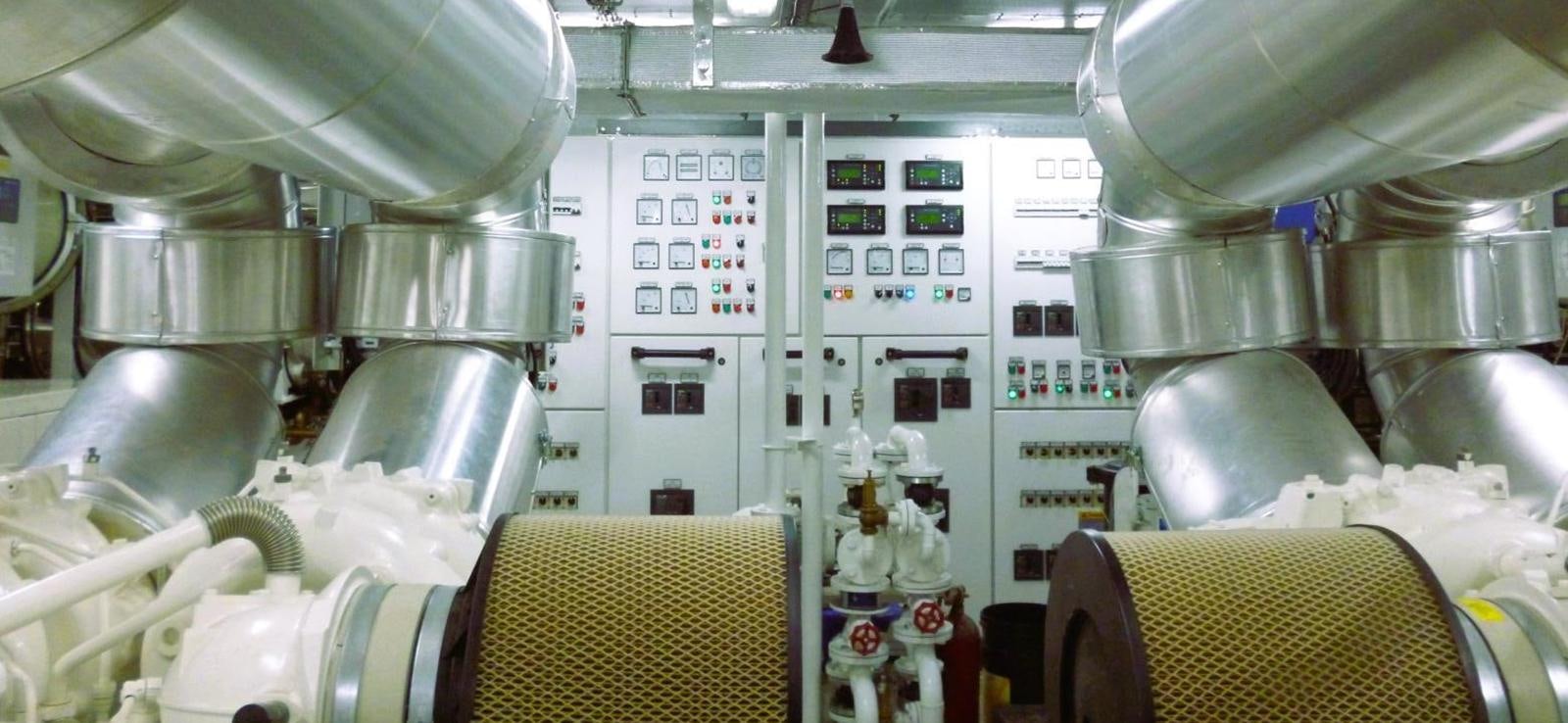 a large kitchen with a large stainless steel stove aboard AETEA Yacht for Sale