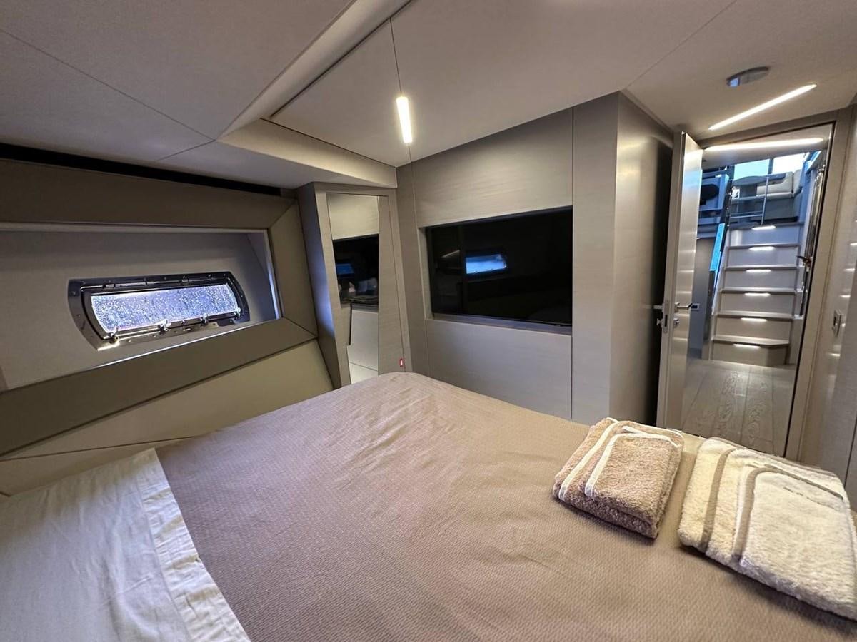 a bed in a room aboard SAAM 1 Yacht for Sale