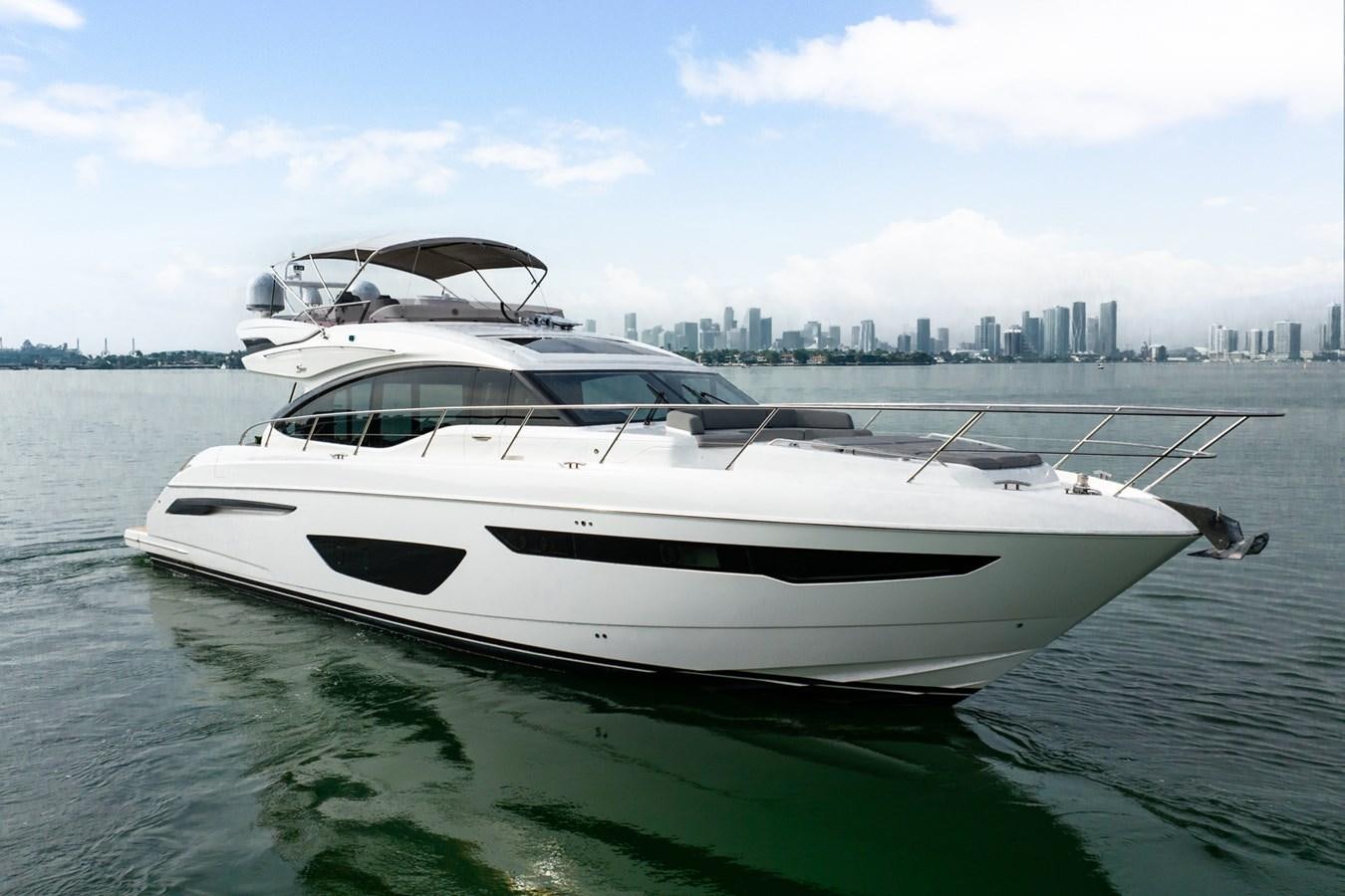 a white yacht on the water aboard CINDERELLA Yacht for Sale