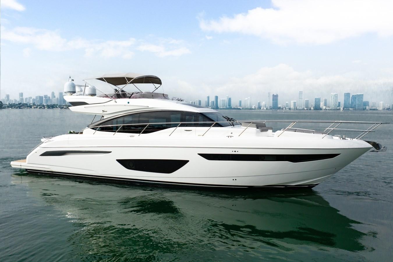 a white yacht on the water aboard CINDERELLA Yacht for Sale