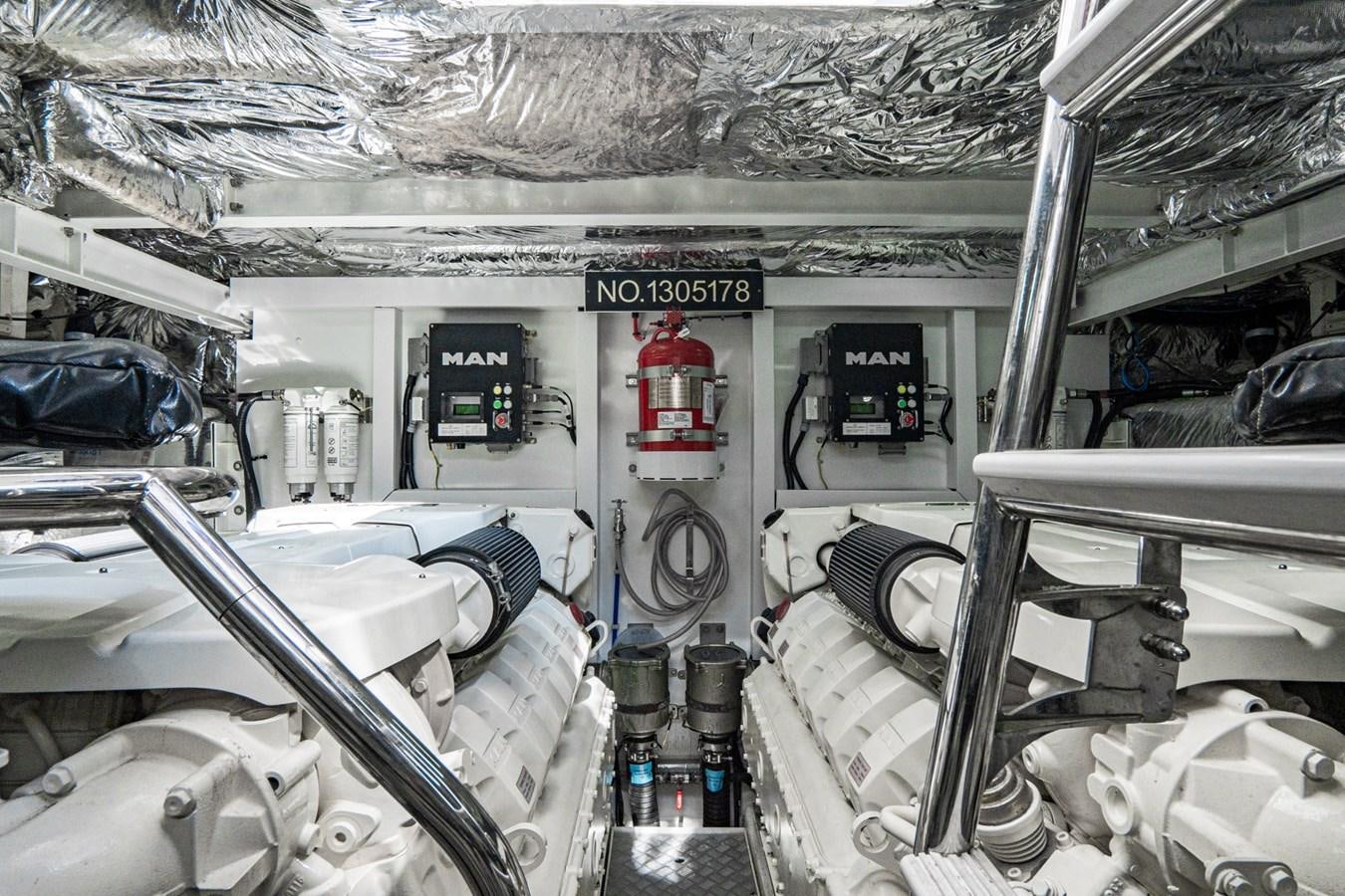 a car with a large engine aboard CINDERELLA Yacht for Sale