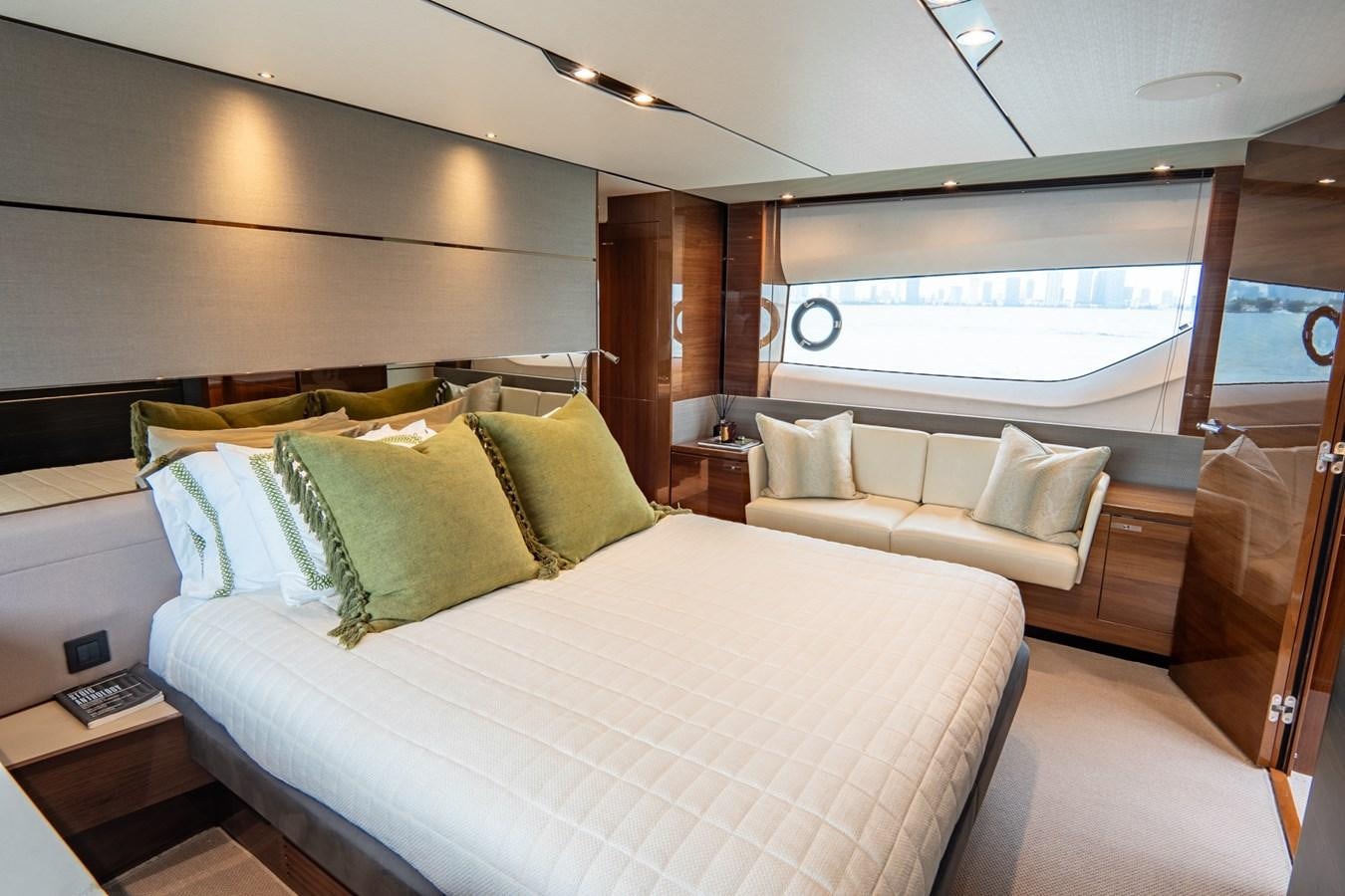 a room with a bed and a window aboard CINDERELLA Yacht for Sale