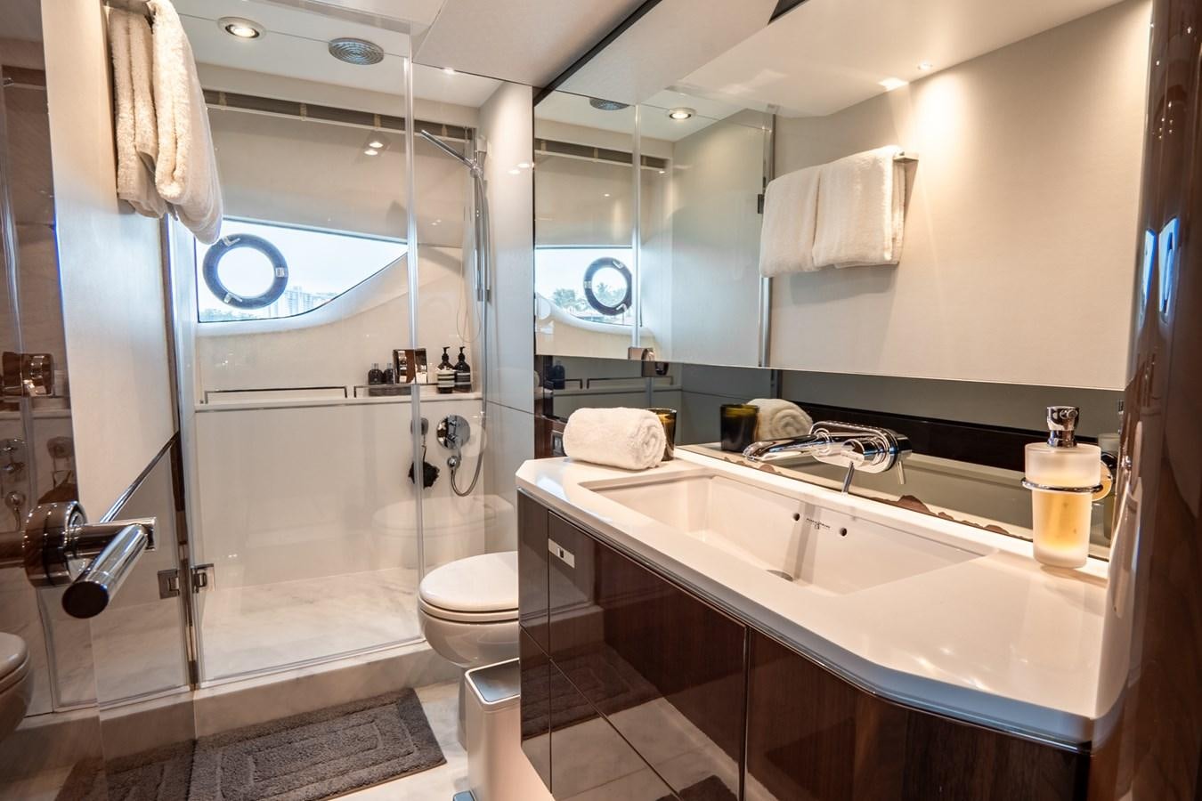 a bathroom with a large mirror aboard CINDERELLA Yacht for Sale