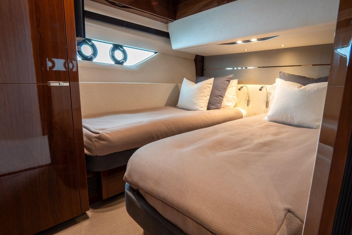 a room with two beds aboard CINDERELLA Yacht for Sale