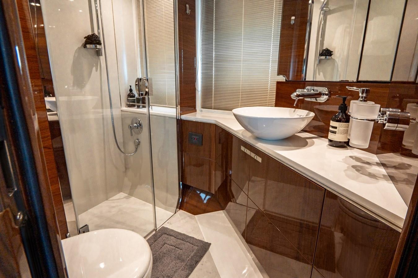 a bathroom with a sink and a shower aboard CINDERELLA Yacht for Sale