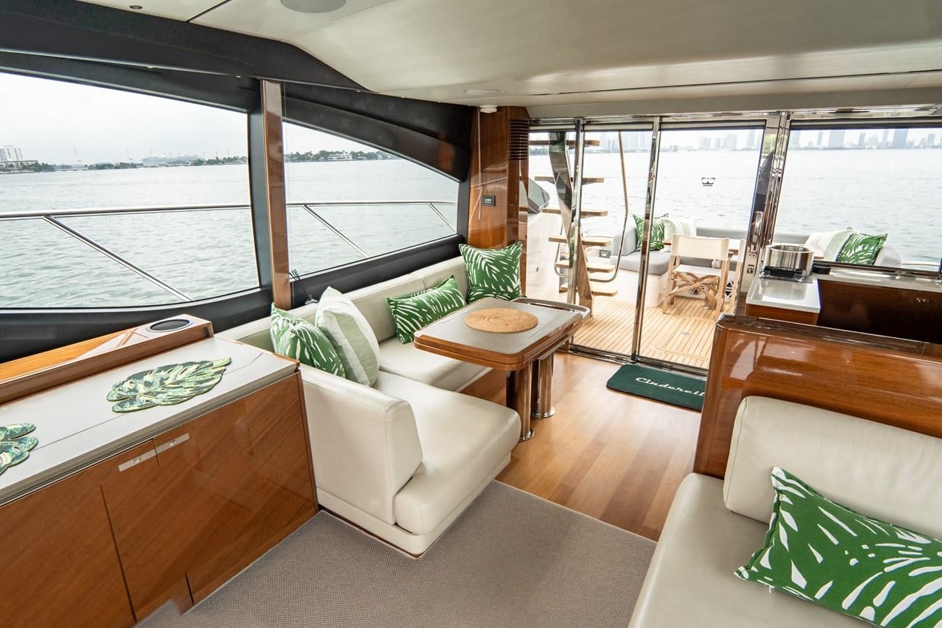 a living room with a large window aboard CINDERELLA Yacht for Sale
