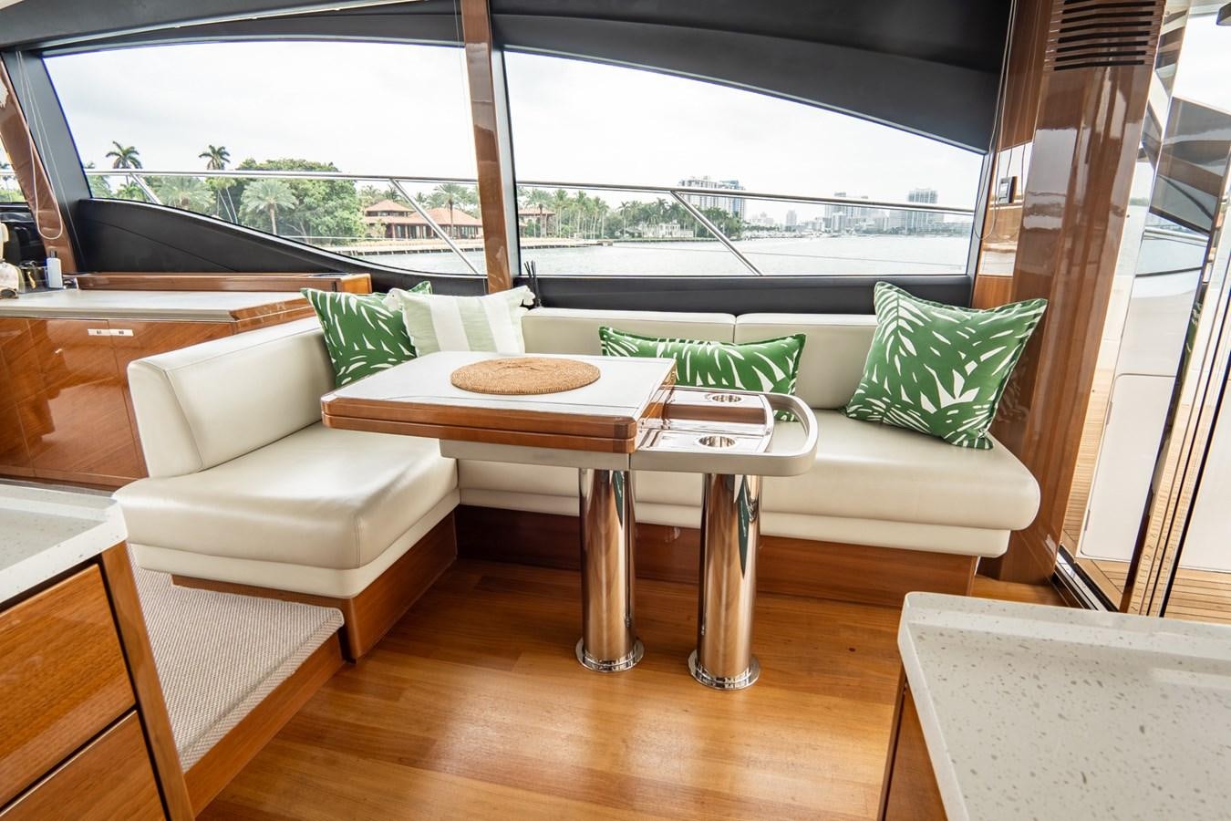 a room with a table and chairs aboard CINDERELLA Yacht for Sale
