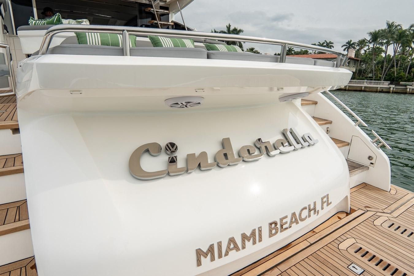 a white boat on a dock aboard CINDERELLA Yacht for Sale