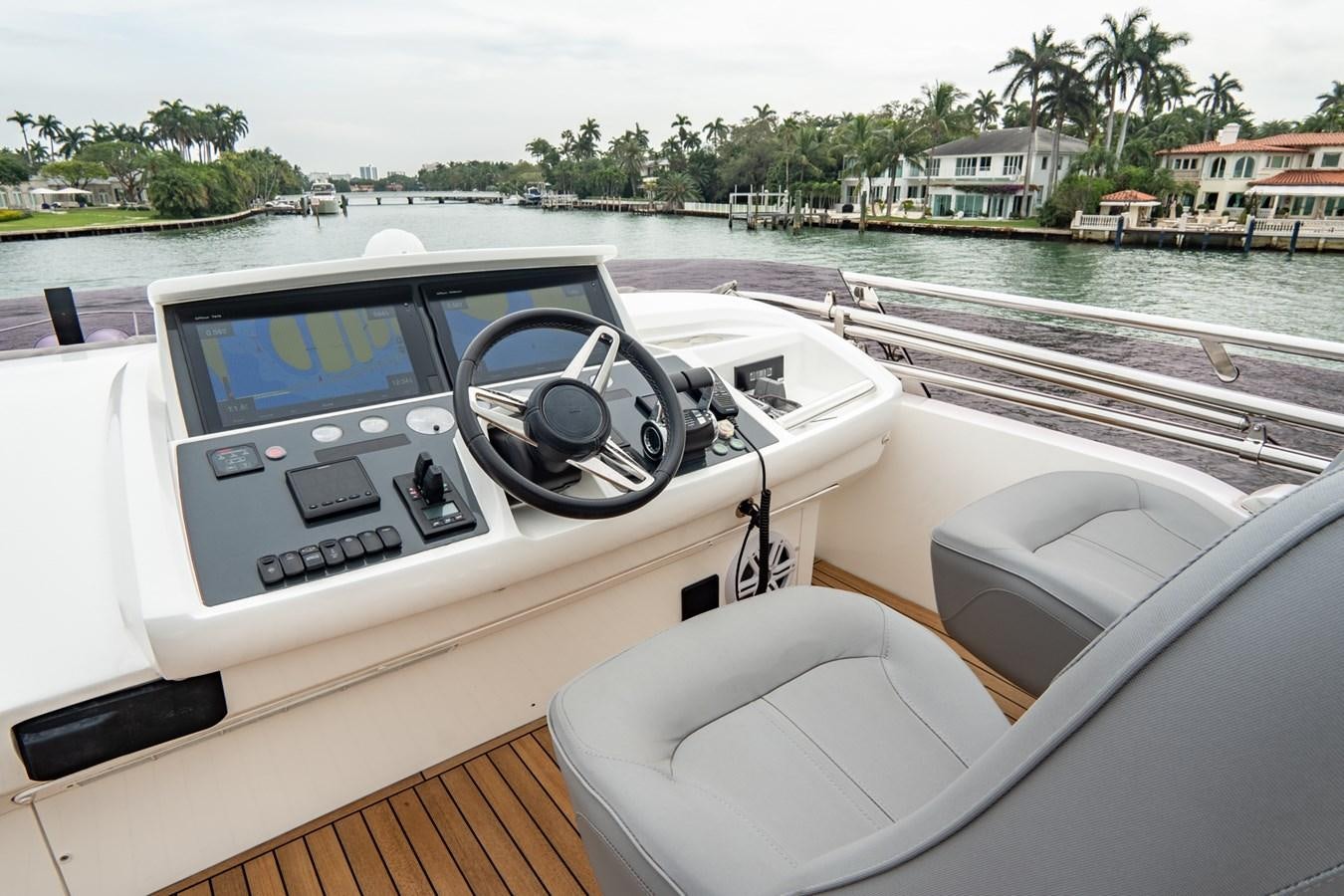 a boat with a steering wheel aboard CINDERELLA Yacht for Sale