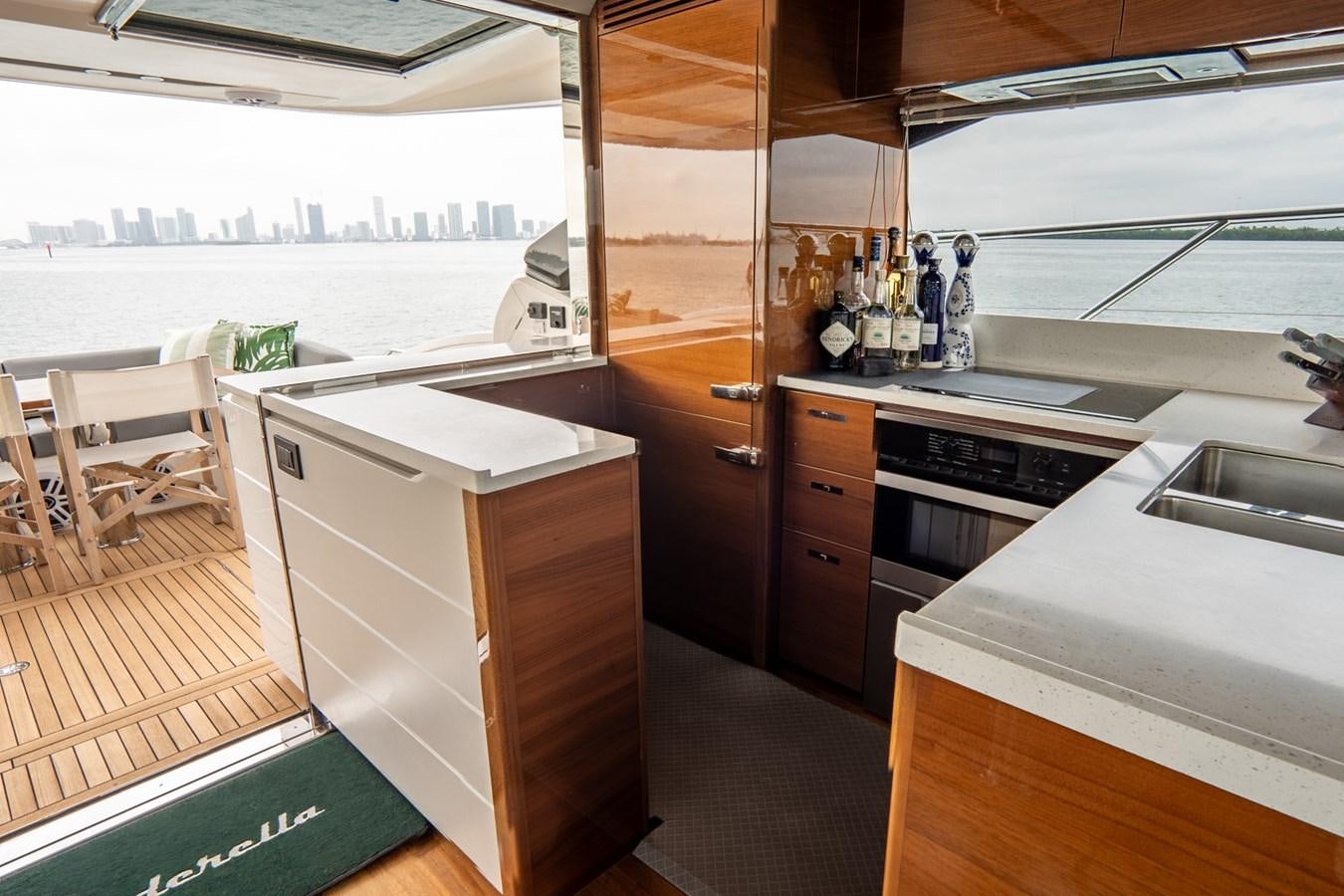 a kitchen with a sliding door aboard CINDERELLA Yacht for Sale