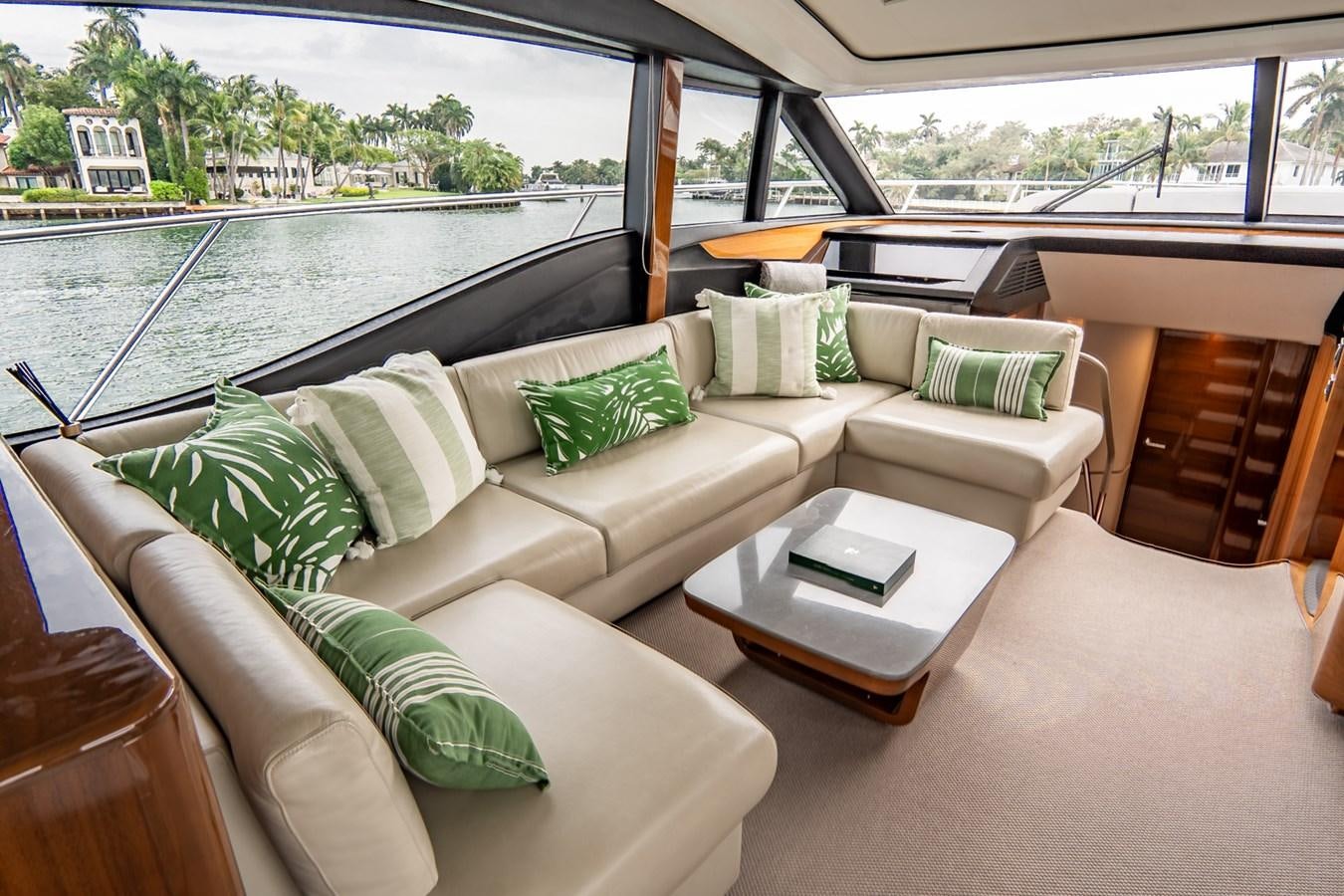a couch with pillows on it aboard CINDERELLA Yacht for Sale