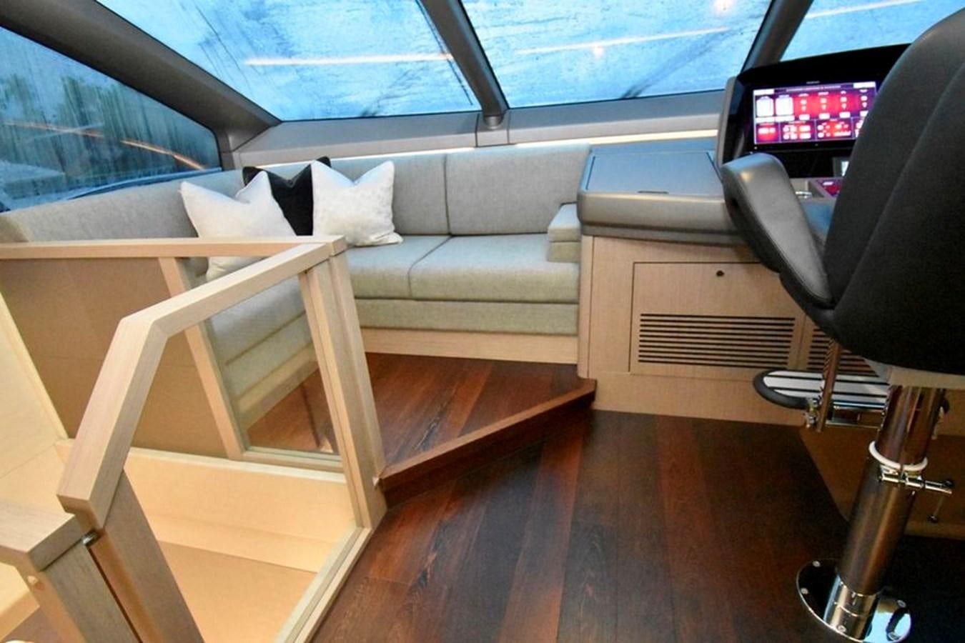 a room with a couch and a television aboard DO  ANYWAY Yacht for Sale