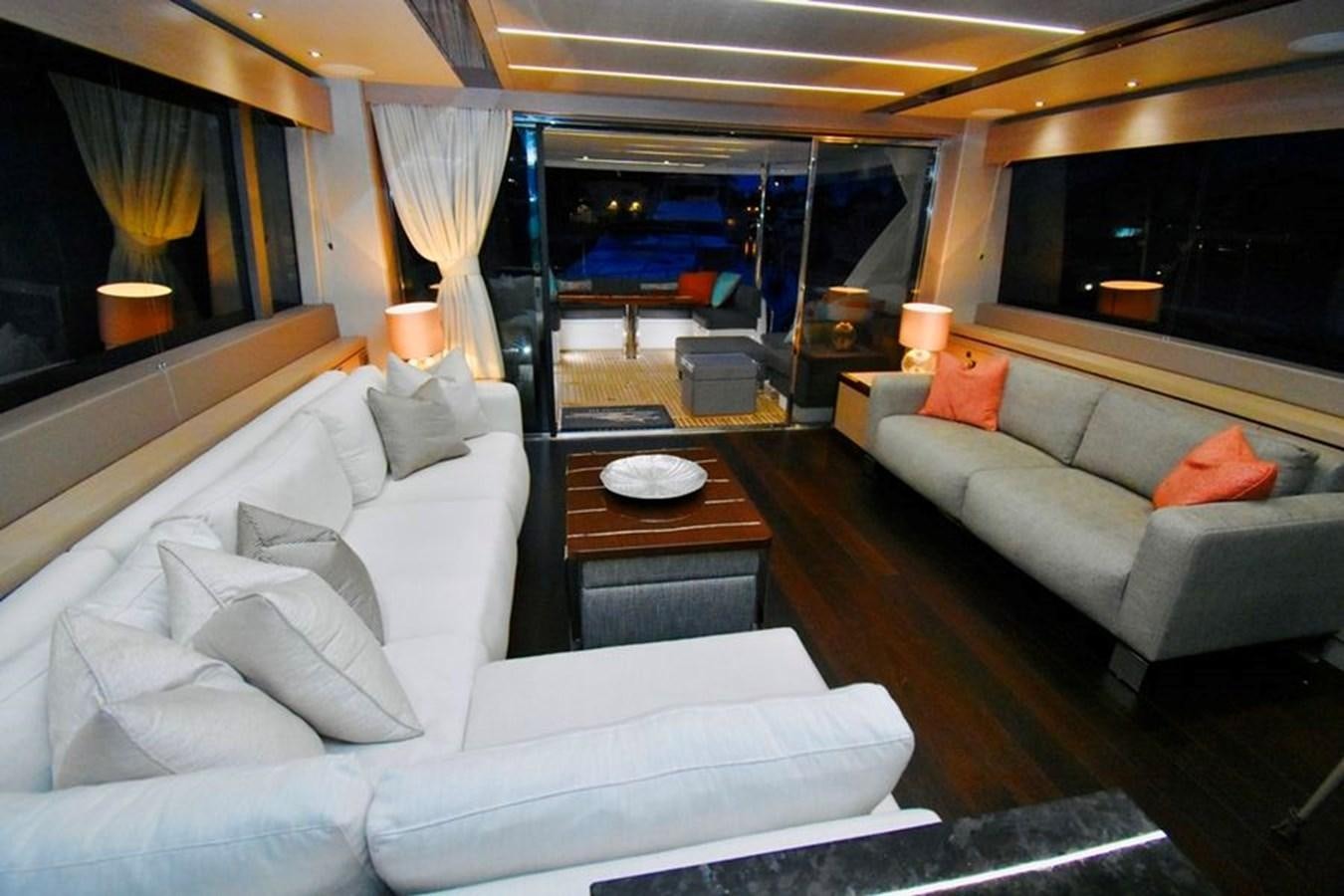 a living room with a couch and a coffee table aboard DO  ANYWAY Yacht for Sale