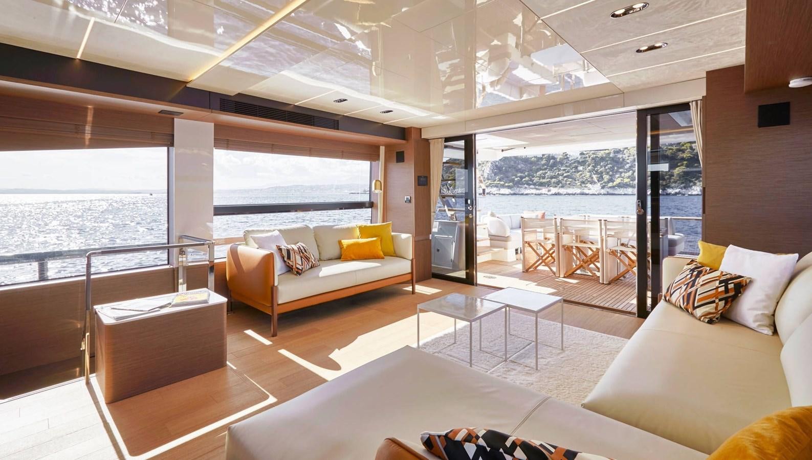 a living room with a large window aboard 2024 PRESTIGE X-LINE X70 Yacht for Sale